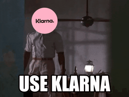 a man with a klarna logo on his head