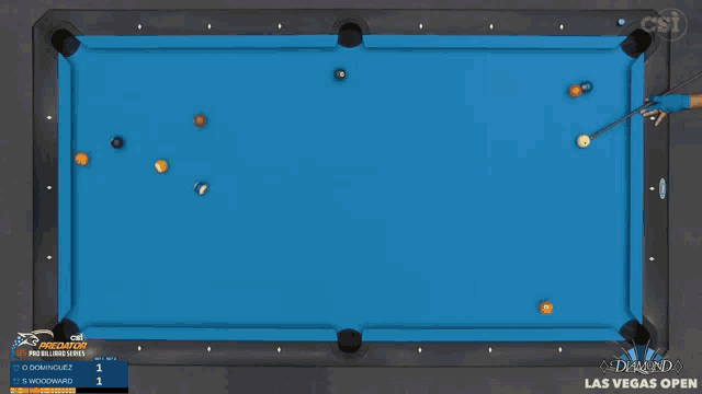 a man wearing a mask stands in front of a pool table that says diamond