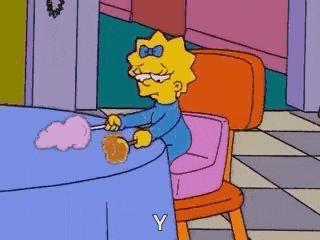 maggie simpson from the simpsons is sitting in a pink chair .