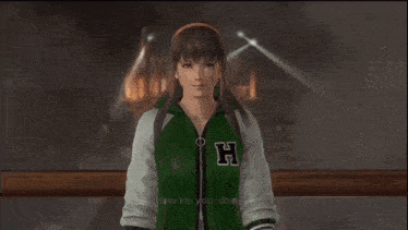 a girl in a green jacket with the letter h on it says one more fight one more and i 'm champion