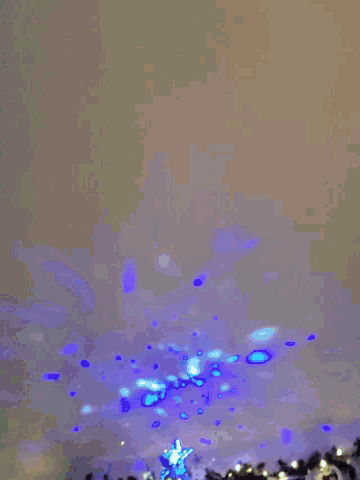 a blurry picture of a pink and purple colored background