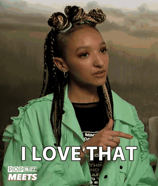 a woman in a green jacket says " i love that " in a pop buzz meets advertisement