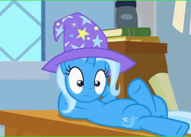 a cartoon pony wearing a purple hat with stars