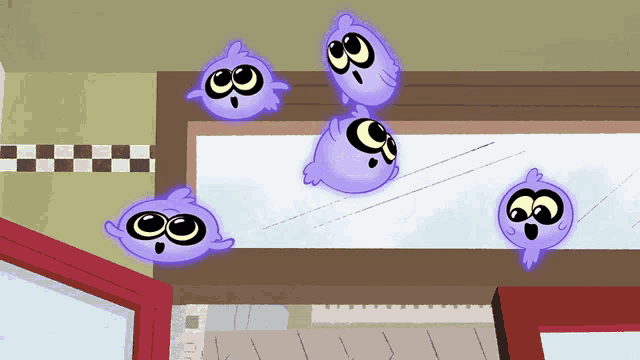 a group of purple cartoon characters with the number 3 on them