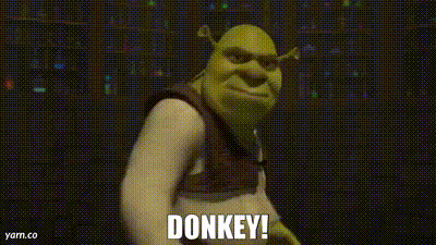 shrek from shrek is screaming at the camera and says donkey .