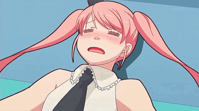 a girl with pink hair and a black tie is laying on the floor