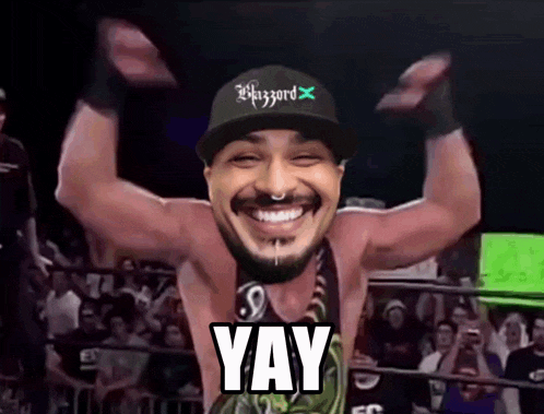 a man wearing a hat that says blizzard is smiling and saying yay