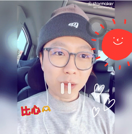 a man wearing glasses and a beanie is using the stormmaker app on his phone