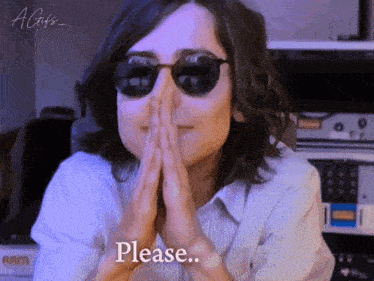 a woman wearing sunglasses and a striped shirt is praying with her hands folded and says please
