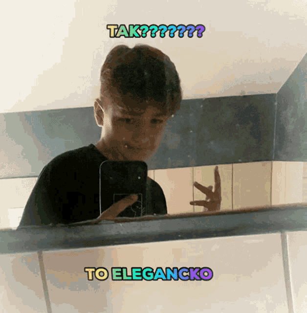 a boy taking a picture of himself in a mirror with the words tak to elegancko