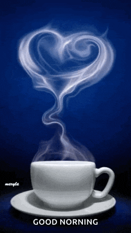 a cup of coffee with steam coming out of it in the shape of a heart