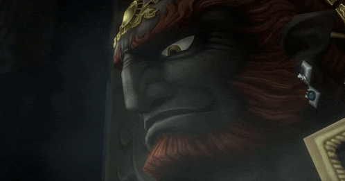 a statue of a monster with a beard and a crown
