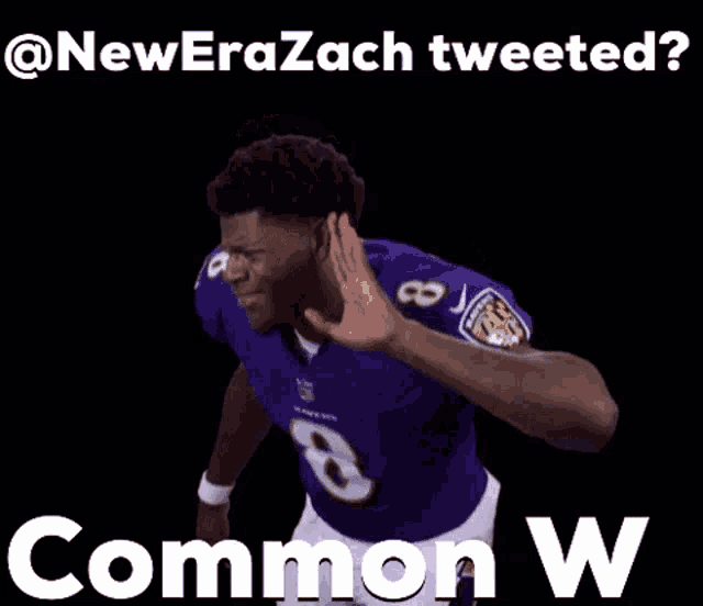 a football player in a purple jersey with the number 8 pointing at something