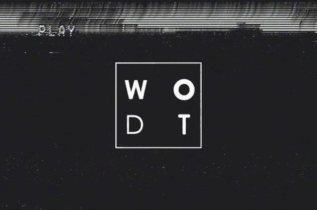 a black and white striped background with the letters w and t