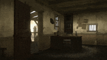a room with a desk and papers on the wall including one that says wanted
