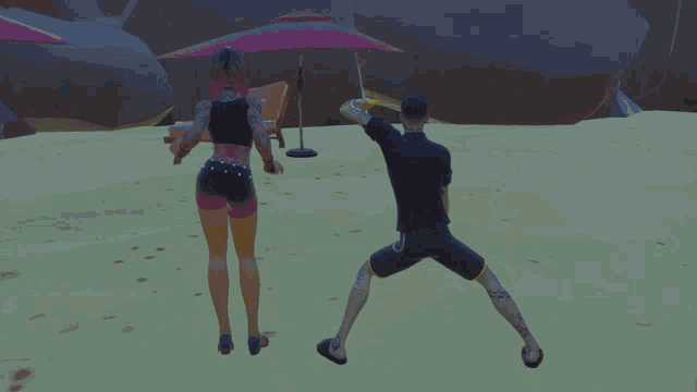 a man squatting on the beach while a woman stands in the background