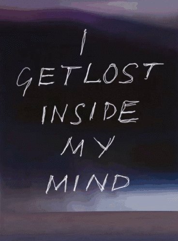 a blackboard with the words " i get lost inside my mind " written on it