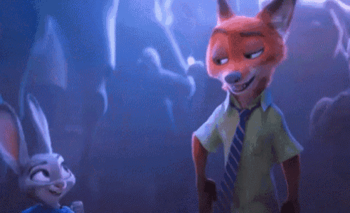 a fox and a rabbit are standing next to each other .