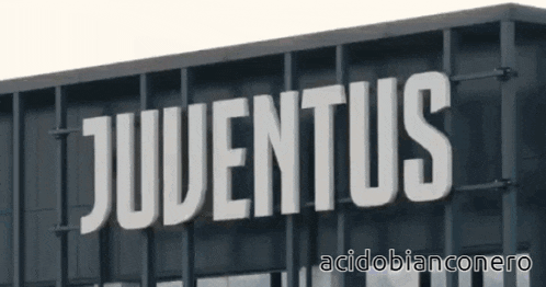 a sign that says juventus on it in white
