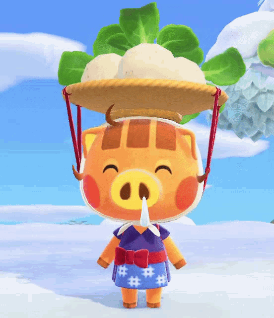 a pig wearing a hat with vegetables on it stands in the snow