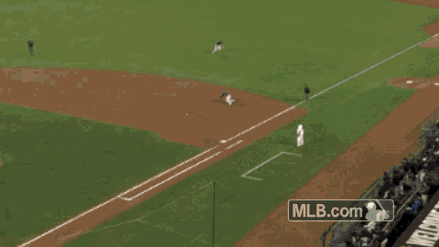 a baseball game is being played with a mlb.com logo in the corner