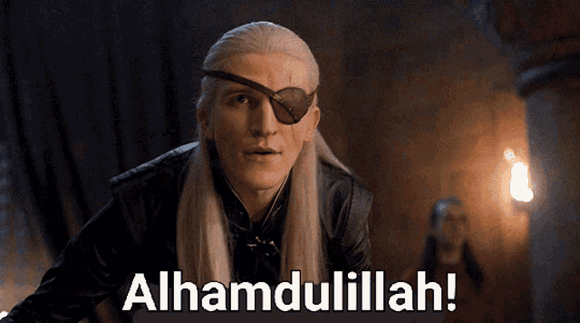 a man with a patch on his eye and the words alhamdulillah on the bottom