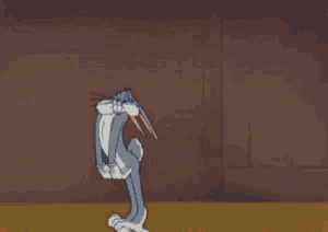 a cartoon of a man kicking a rabbit with the number 1 on the ground