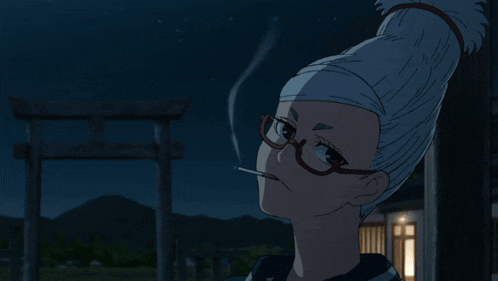 a woman with glasses is smoking a cigarette