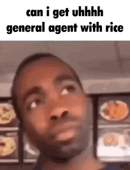 a man is making a funny face while standing in front of a restaurant .