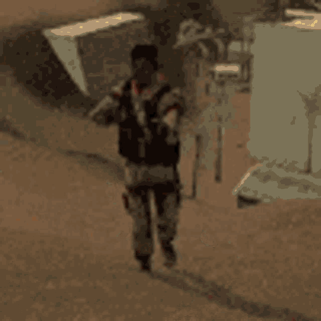 a person is flying through the air while holding a gun .