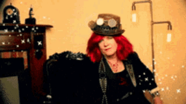 a woman with red hair wearing a steampunk hat