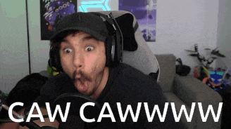a man wearing a hat and headphones says caw cawwww