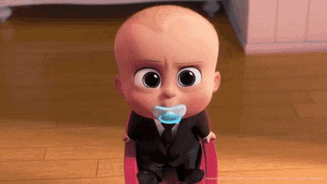 a cartoon baby with a pacifier in his mouth