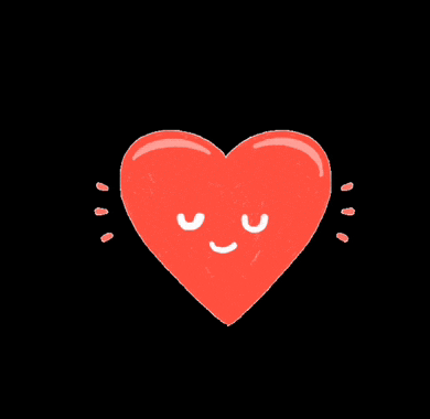 a red heart with a smiling face on it