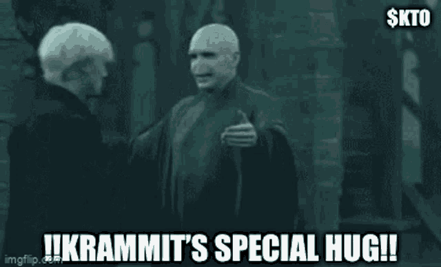 a couple of people hugging each other with the words `` krammit 's special hug '' written on the bottom .