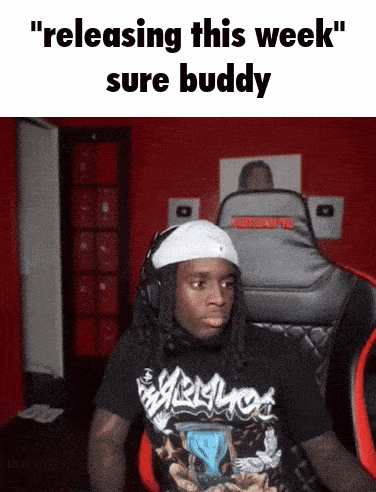 a man wearing headphones and a black shirt says " releasing this week "