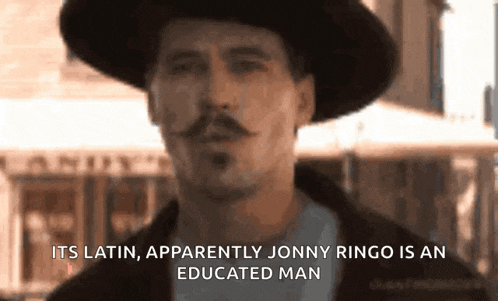 a man with a hat and a mustache has the words " its latin apparently jonny ringo is an educated man " below him