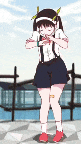 a girl in a white shirt and black shorts is dancing with her eyes closed
