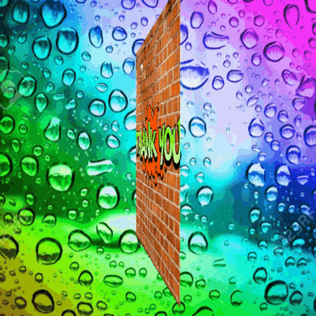 a brick wall with the words thank you written on it is surrounded by water drops