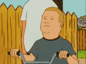 a cartoon character from king of the hill is riding a bicycle .