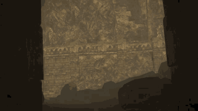 a dark room with a brick wall and rocks