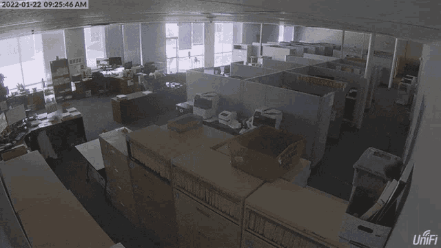 a busy office with a time stamp of 2022-01-22