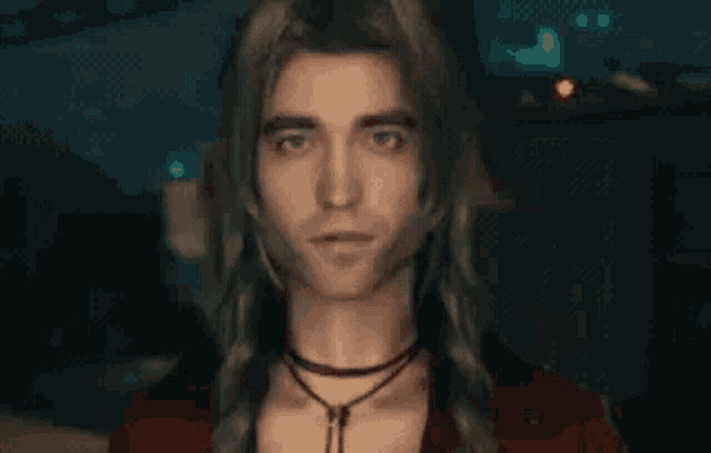 a man with long hair is wearing a red shirt and a necklace .