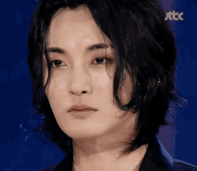 a close up of a person 's face with jtbc written on the bottom right