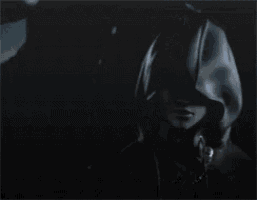 a person with a hood on their head and sunglasses on