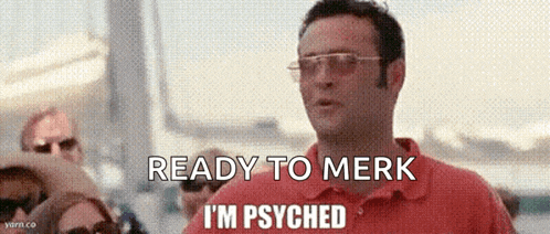 a man wearing glasses and a red shirt is ready to merk i 'm psyched
