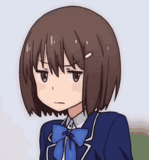 a girl with short brown hair and a blue bow tie