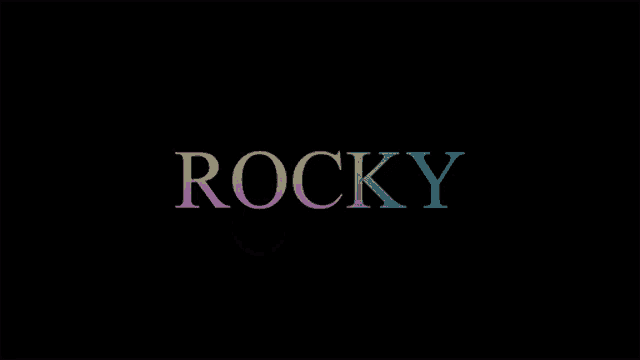 a black background with a rainbow colored r o c y k