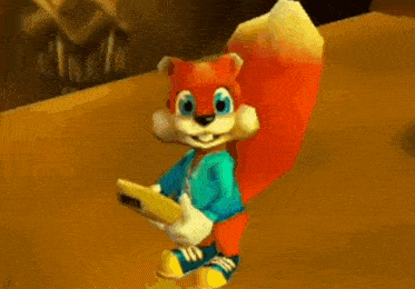a cartoon squirrel is holding a remote control and smiling while standing on a table .