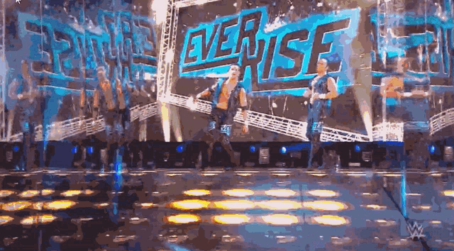 the word everise is on a large screen